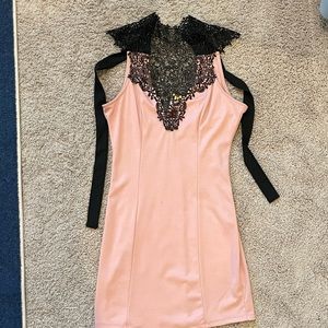 Blush pink and black fitted mini dress